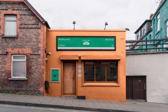 Orange building exterior mockup with signage, ideal for restaurant branding presentation in an urban Dublin setting for graphic designers.